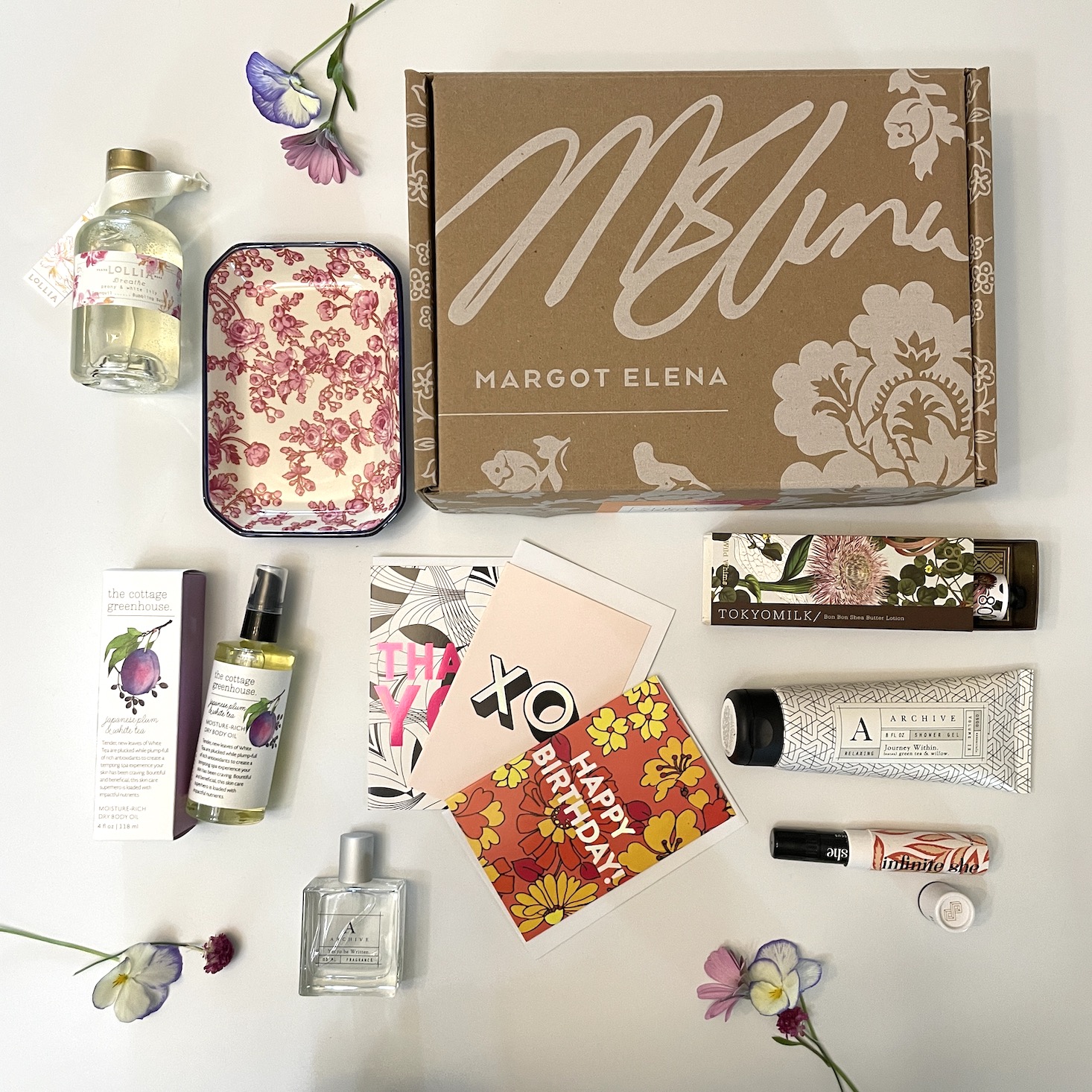 A mix of beauty and self-care products from the Summer 2023 Margot Elena box.